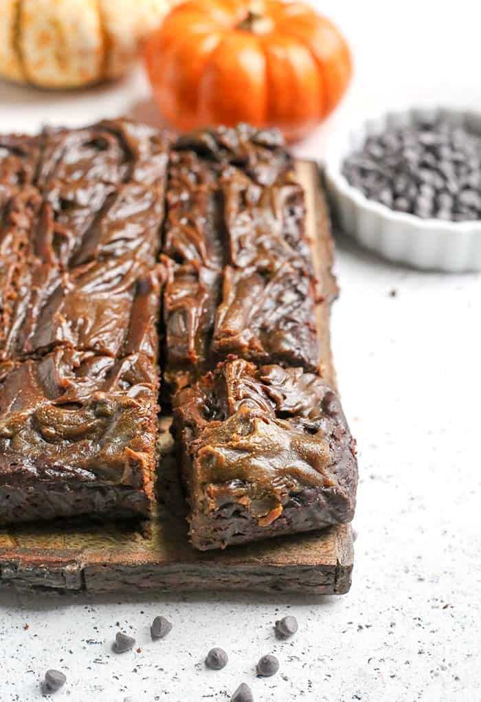 These Paleo Vegan Pumpkin Swirl Brownies are so rich, delicious, and easy to make! They are gluten free, dairy free, egg free, vegan, nut free, and naturally sweetened.