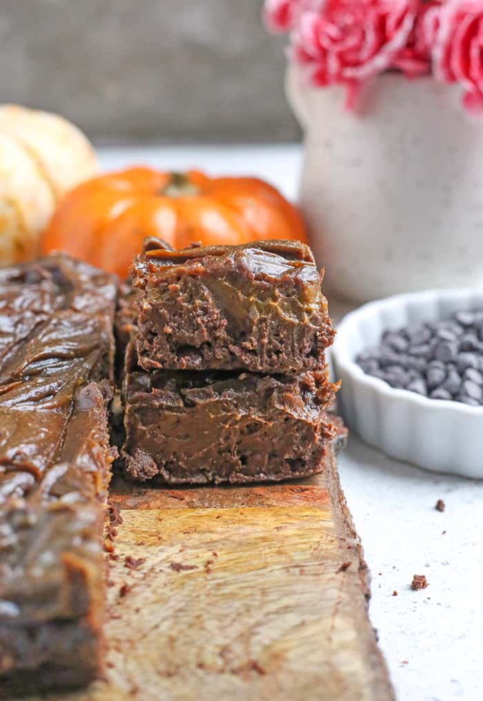 These Paleo Vegan Pumpkin Swirl Brownies are so rich, delicious, and easy to make! They are gluten free, dairy free, egg free, vegan, nut free, and naturally sweetened.