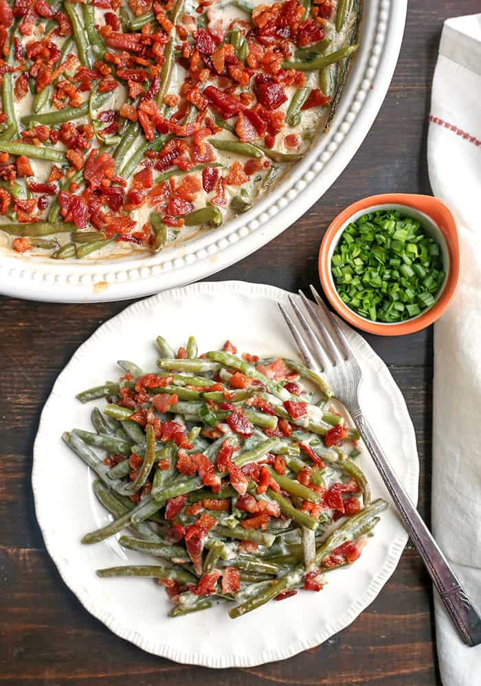 This Paleo Low FODMAP Green Bean Casserole is easy to make, full of flavor, and a healthy side dish. The green beans are covered in a creamy sauce and topped with bacon. Gluten free, dairy free, and Whole30. 