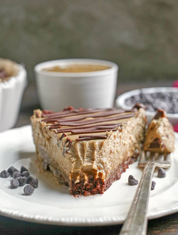 This Nut-Free Paleo Vegan Snickers Pie is an easy no-bake dessert and incredibly delicious! A chewy chocolate crust, creamy caramel layer and soft SunButter mousse. It's gluten free, dairy free, and naturally sweetened.