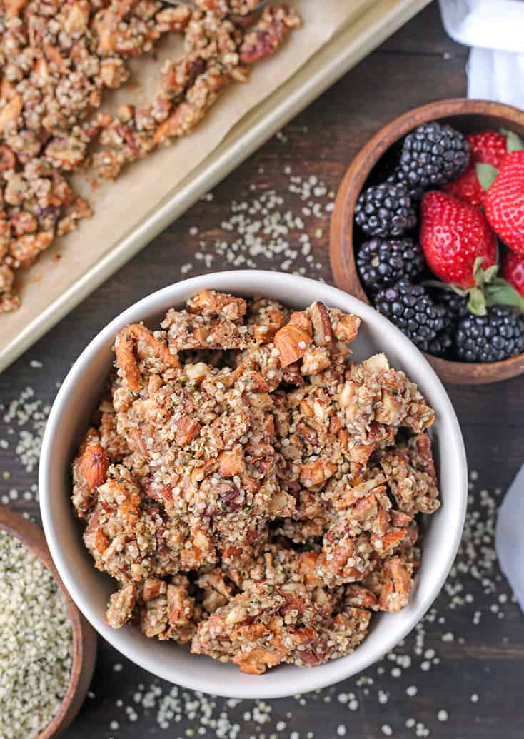 This Paleo Caramel Apple Granola is easy to make and is such a great snack. The sweet cinnamon, chewy apples, and crunchy seeds combine to make a tasty treat. It's gluten free, dairy free, naturally sweetened and vegan.
