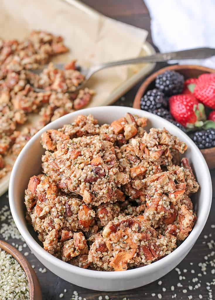 This Paleo Caramel Apple Granola is easy to make and is such a great snack. The sweet cinnamon, chewy apples, and crunchy seeds combine to make a tasty treat. It's gluten free, dairy free, naturally sweetened and vegan.