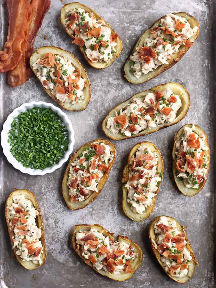 These Paleo Chicken Bacon Ranch Potato Skins make a great meal or appetizer. Juicy chicken, creamy ranch, and crispy bacon packed in a potato skin. They are Whole30, gluten free, dairy free, and low FODMAP.