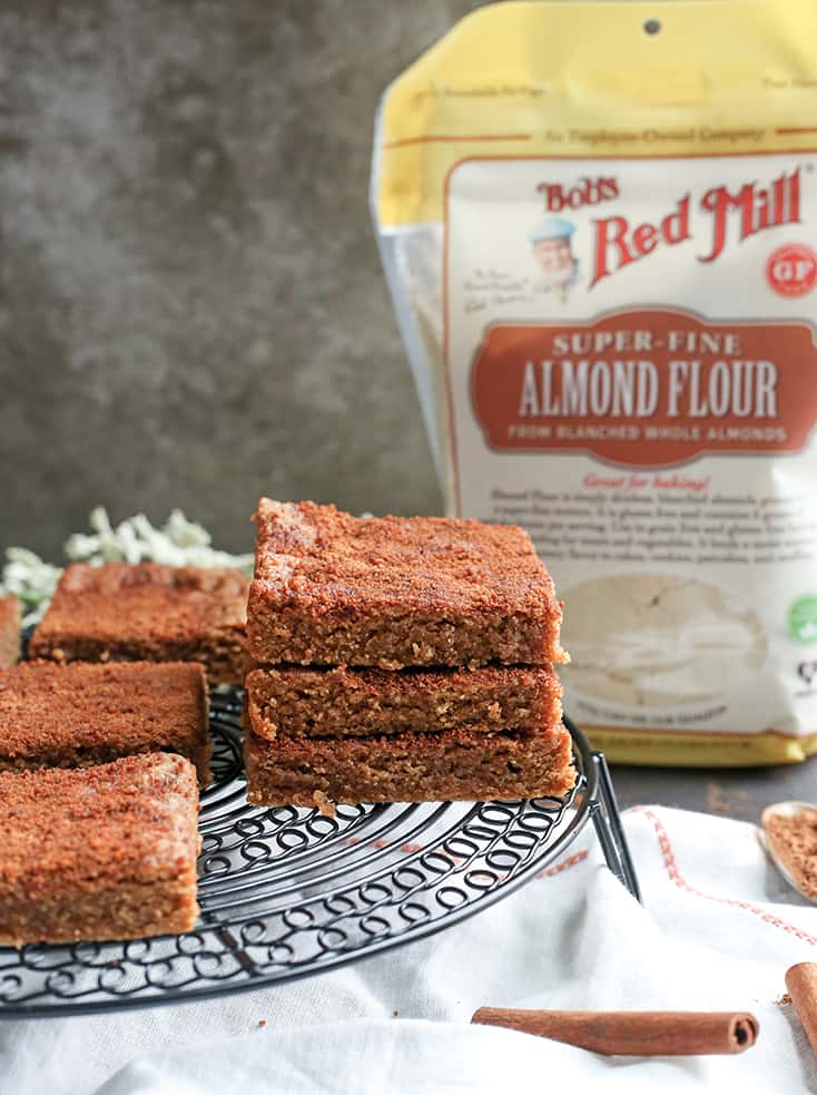 These Paleo Snickerdoodle Blondie Bars are quick, easy and so delicious! All the flavors of a snickerdoodle cookie, made in bar form. Gluten free, dairy free, and naturally sweetened.