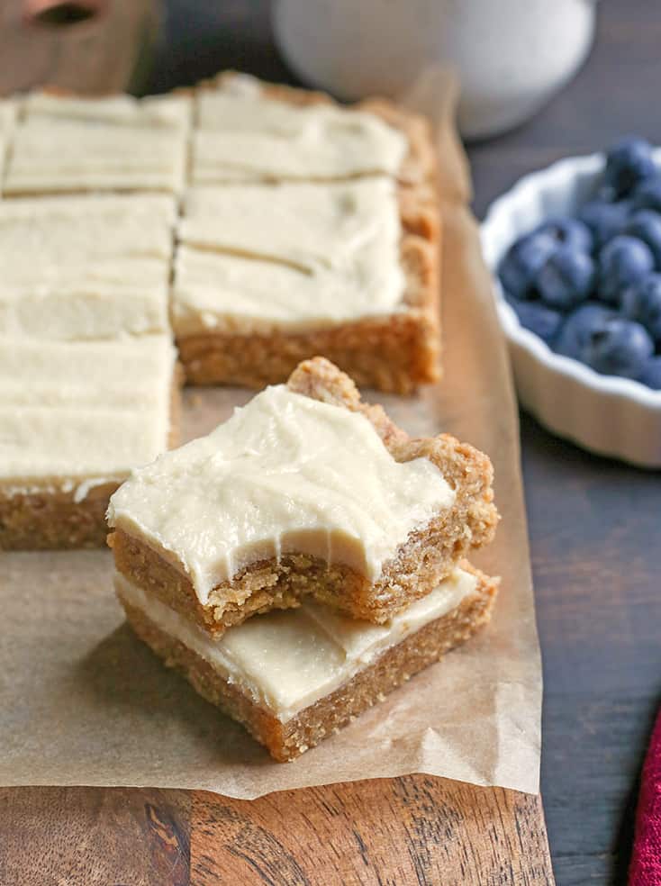 These Paleo Sugar Cookie Bars are so easy to make and have all the same flavors as a sugar cookie. Gluten free, dairy free and naturally sweetened.