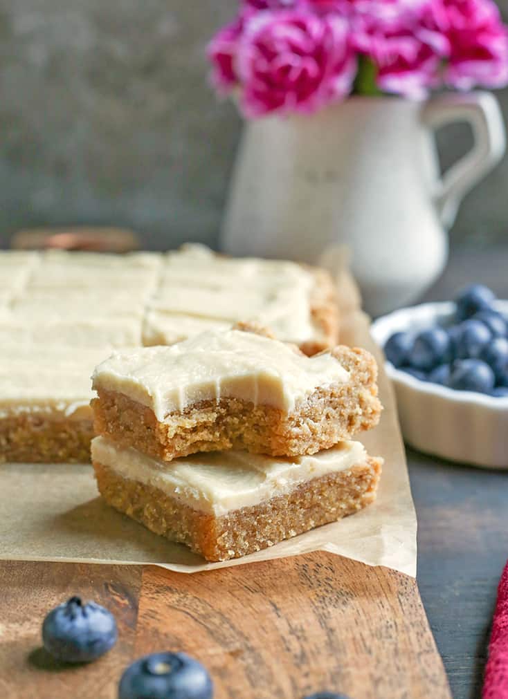These Paleo Sugar Cookie Bars are so easy to make and have all the same flavors as a sugar cookie. Gluten free, dairy free and naturally sweetened.