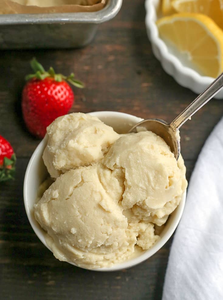 This Paleo Lemon Zest Ice Cream is tangy, creamy, and so delicious! Easy to make and dairy free, naturally sweetened and low FODMAP.