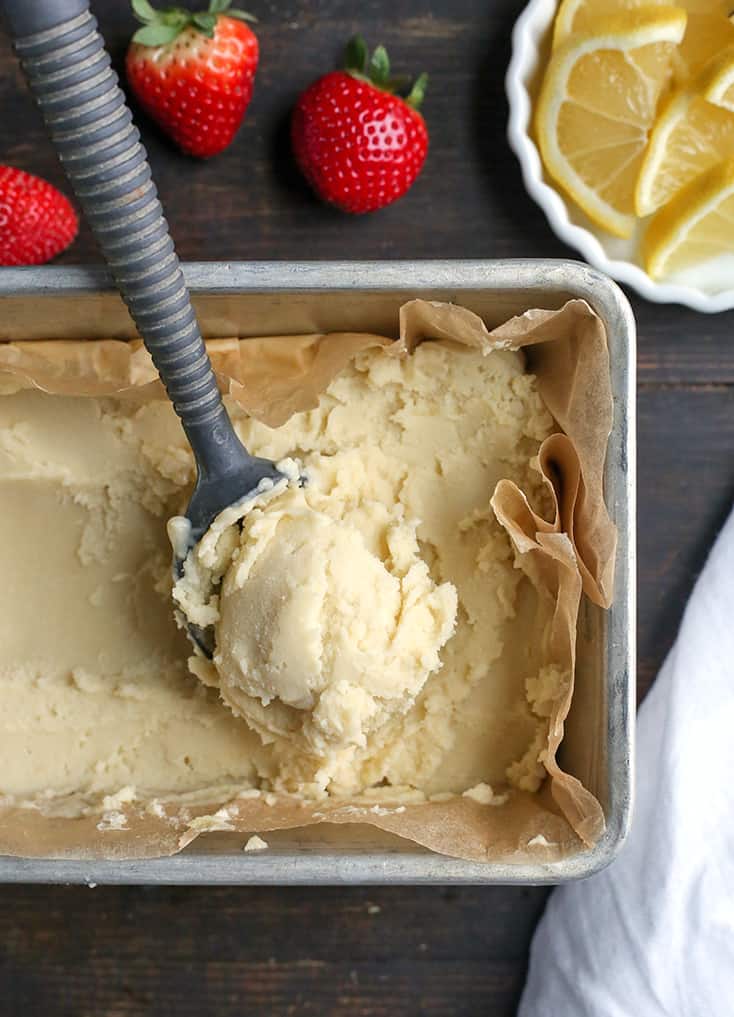 This Paleo Lemon Zest Ice Cream is tangy, creamy, and so delicious! Easy to make and dairy free, naturally sweetened and low FODMAP.