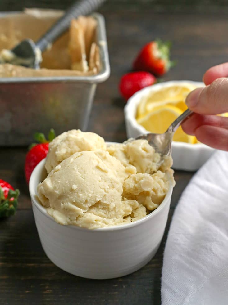 This Paleo Lemon Zest Ice Cream is tangy, creamy, and so delicious! Easy to make and dairy free, naturally sweetened and low FODMAP.