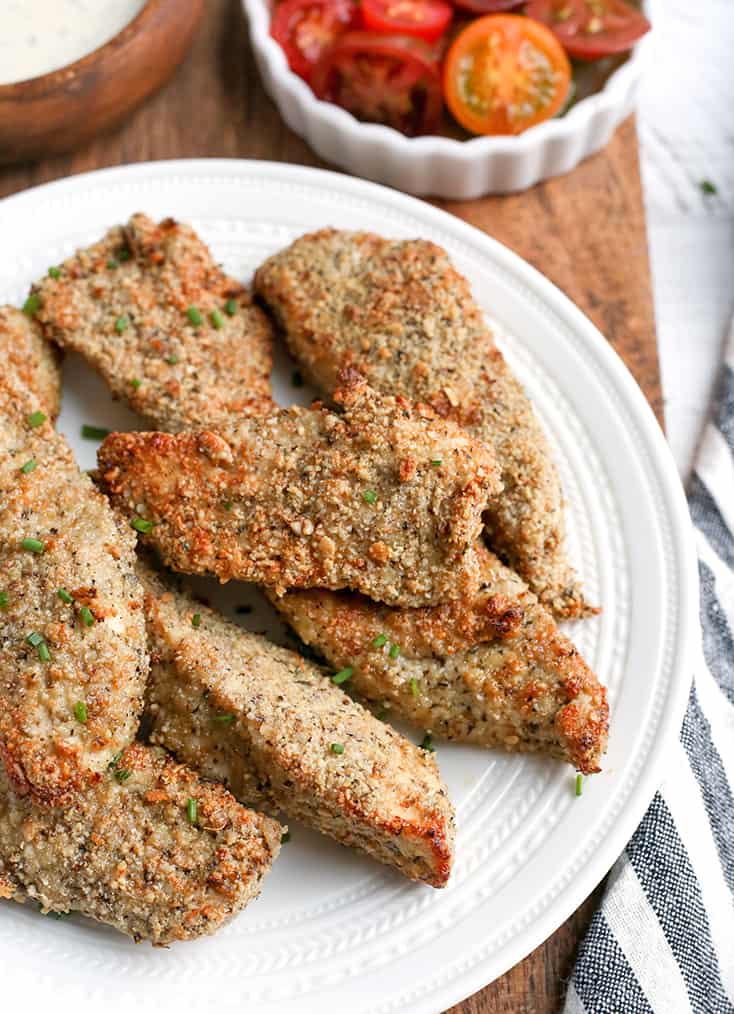 This Paleo Whole30 Air Fryer Breaded Chicken tastes amazing, is crispy, and healthy. Gluten free, dairy free, nut free, egg free, low carb, and low FODMAP.