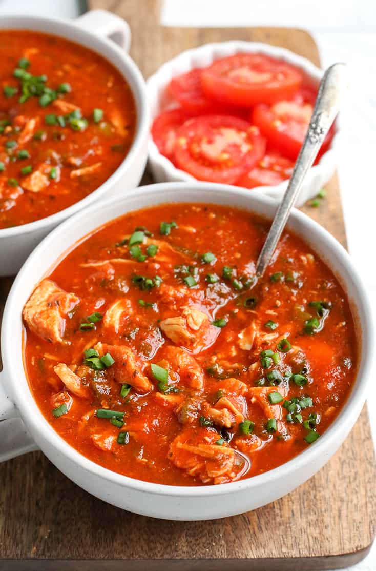 This Paleo Whole30 Chicken Enchilada Soup is easy to make and is so delicious! It's gluten free, dairy free, and low FODMAP.