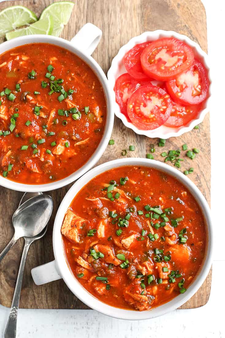 This Paleo Whole30 Chicken Enchilada Soup is easy to make and is so delicious! It's gluten free, dairy free, and low FODMAP.