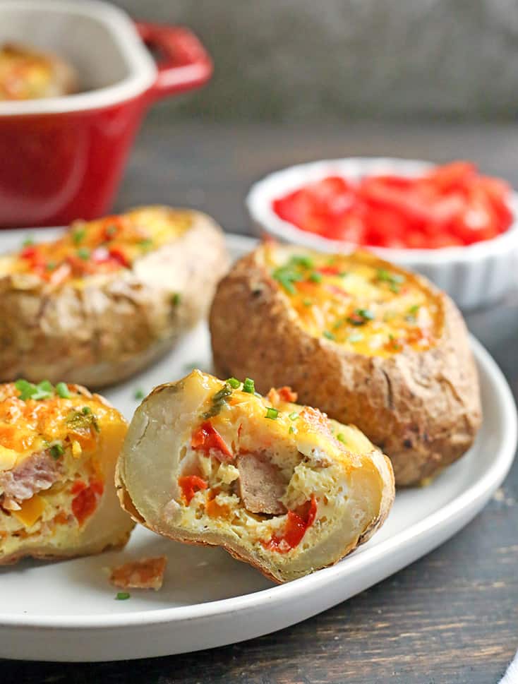 These Paleo Whole30 Egg Potato Boats are a fun and filling breakfast. Packed with sausage, peppers, green onions and of course eggs. They are gluten free, dairy free, and low FODMAP.