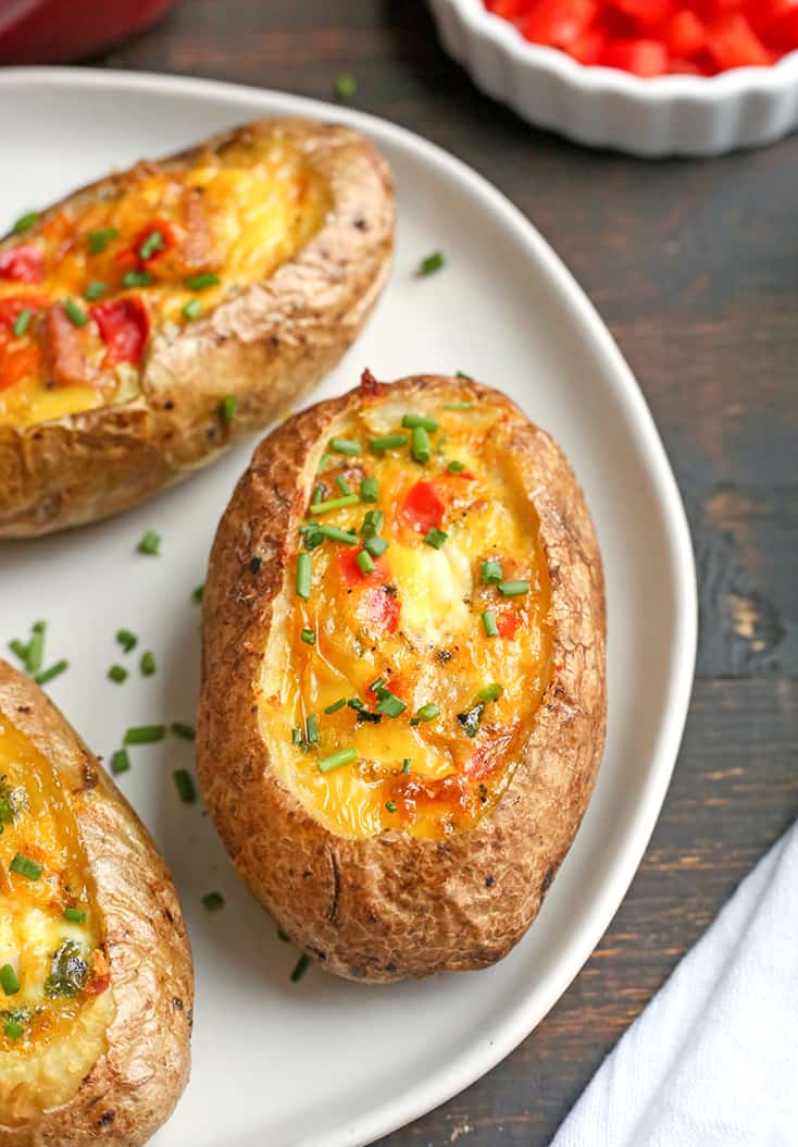 These Paleo Whole30 Egg Potato Boats are a fun and filling breakfast. Packed with sausage, peppers, green onions and of course eggs. They are gluten free, dairy free, and low FODMAP.
