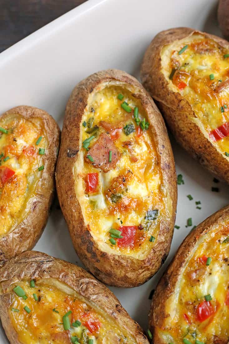 These Paleo Whole30 Egg Potato Boats are a fun and filling breakfast. Packed with sausage, peppers, green onions and of course eggs. They are gluten free, dairy free, and low FODMAP.