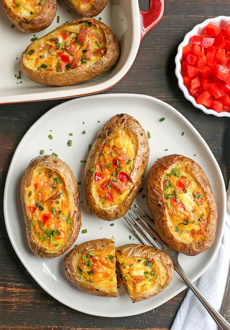 These Paleo Whole30 Egg Potato Boats are a fun and filling breakfast. Packed with sausage, peppers, green onions and of course eggs. They are gluten free, dairy free, and low FODMAP.