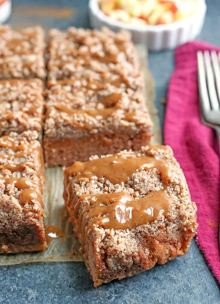 This Paleo Caramel Apple Coffee Cake is tender, moist, with the best crumb topping and a sweet drizzle of caramel. It's gluten free, dairy free, naturally sweetened and so delicious!