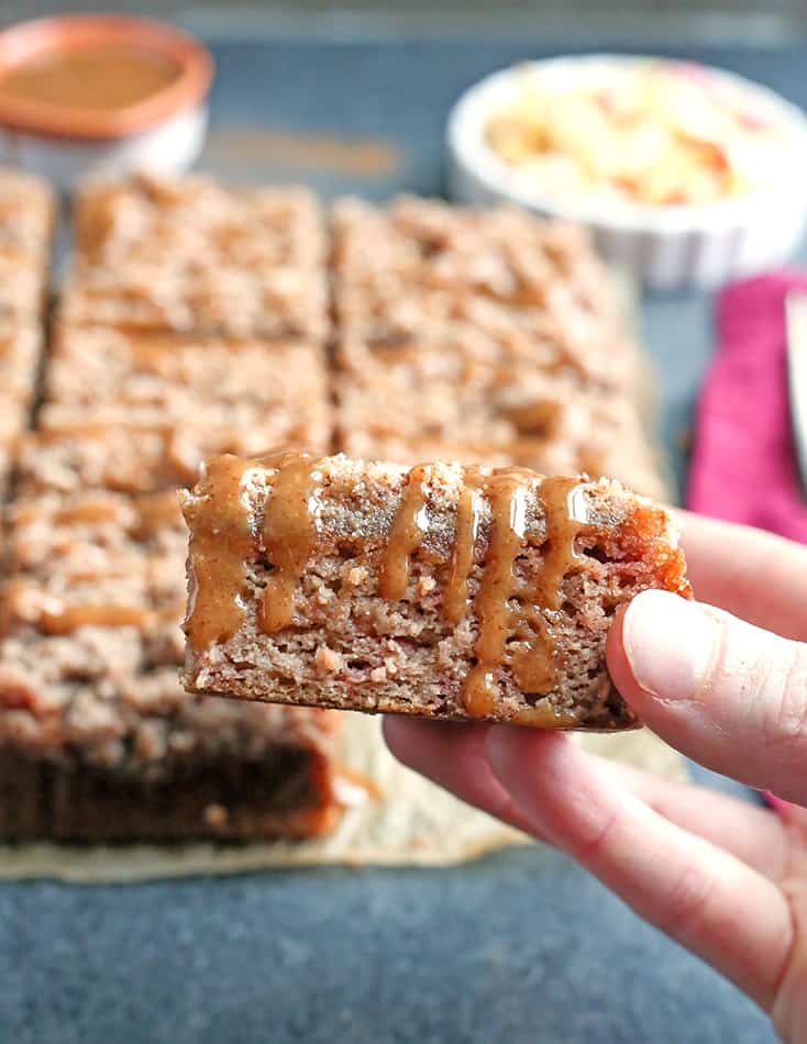 This Paleo Caramel Apple Coffee Cake is tender, moist, with the best crumb topping and a sweet drizzle of caramel. It's gluten free, dairy free, naturally sweetened and so delicious!