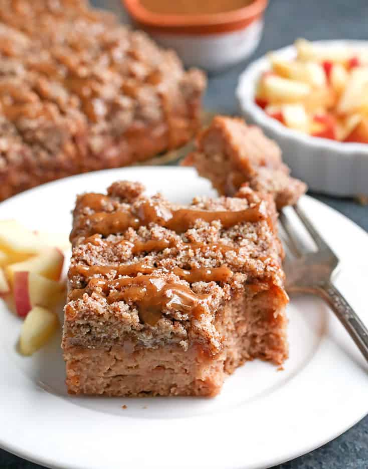 This Paleo Caramel Apple Coffee Cake is tender, moist, with the best crumb topping and a sweet drizzle of caramel. It's gluten free, dairy free, naturally sweetened and so delicious!