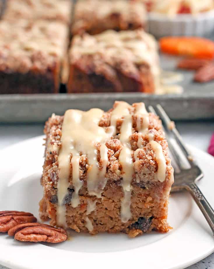 This Paleo Morning Glory Coffee Cake has a moist cake, thick crumb topping with buttery pecans and a sweet glaze. It's delicious while still being gluten free, dairy free, and naturally sweetened. 