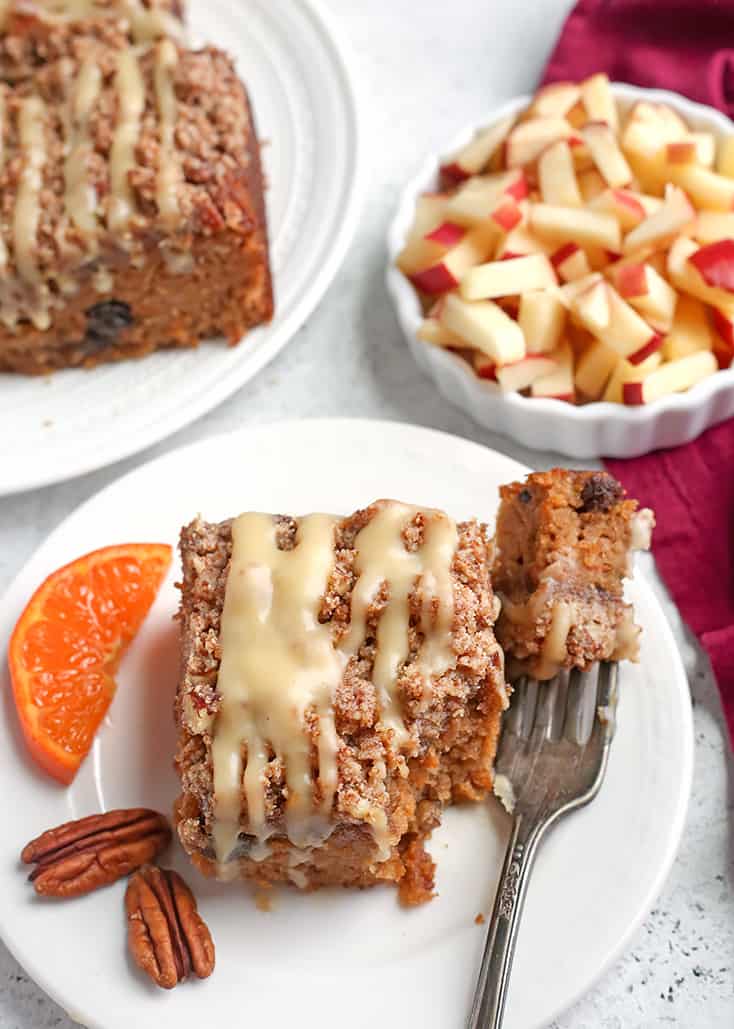 This Paleo Morning Glory Coffee Cake has a moist cake, thick crumb topping with buttery pecans and a sweet glaze. It's delicious while still being gluten free, dairy free, and naturally sweetened. 