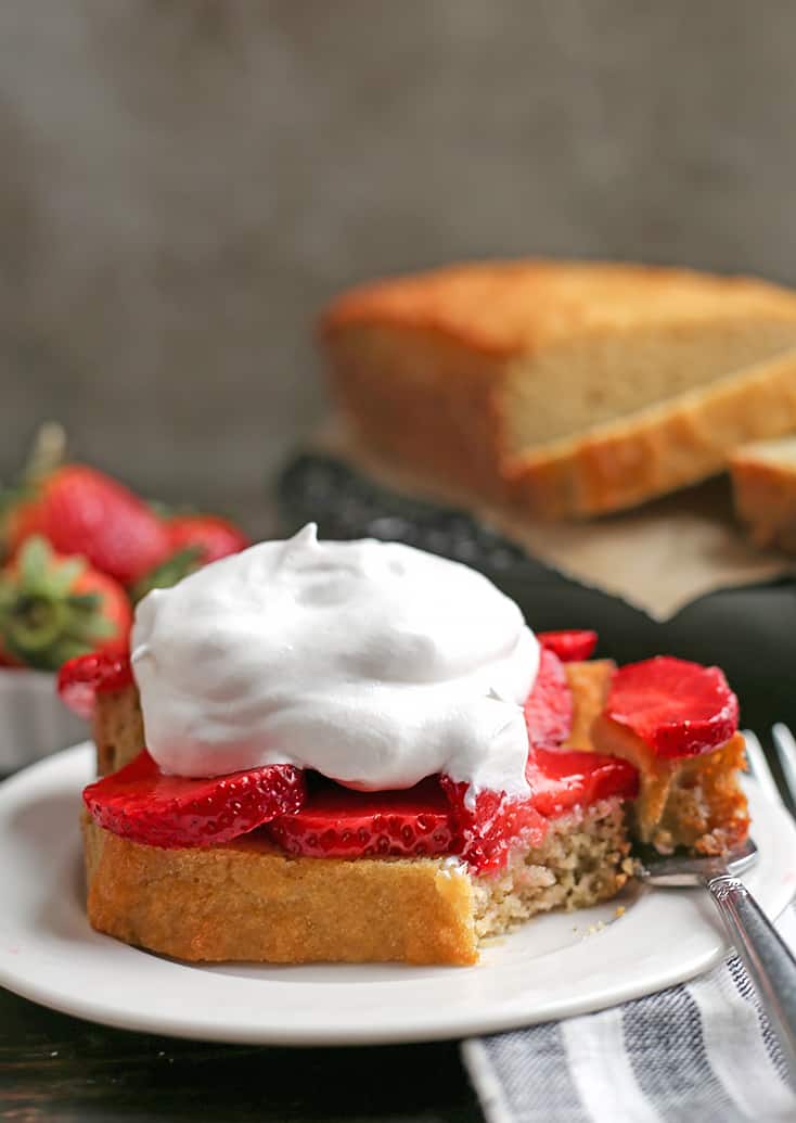 This Paleo Strawberry Shortcake Poundcake is easy to make and a great spring dessert. Tender cake covered in sweet strawberries topped with whipped topping. It's gluten free, dairy free, nut free and delicious!