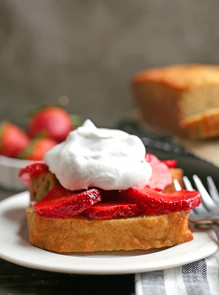 This Paleo Strawberry Shortcake Poundcake is easy to make and a great spring dessert. Tender cake covered in sweet strawberries topped with whipped topping. It's gluten free, dairy free, nut free and delicious!