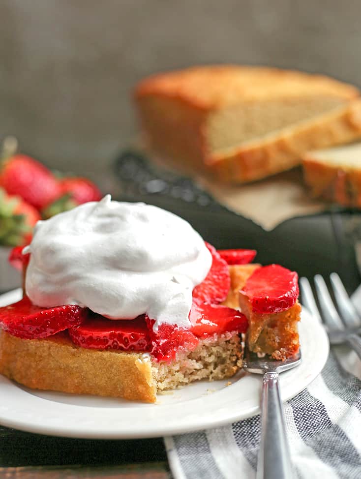 This Paleo Strawberry Shortcake Poundcake is easy to make and a great spring dessert. Tender cake covered in sweet strawberries topped with whipped topping. It's gluten free, dairy free, nut free and delicious!