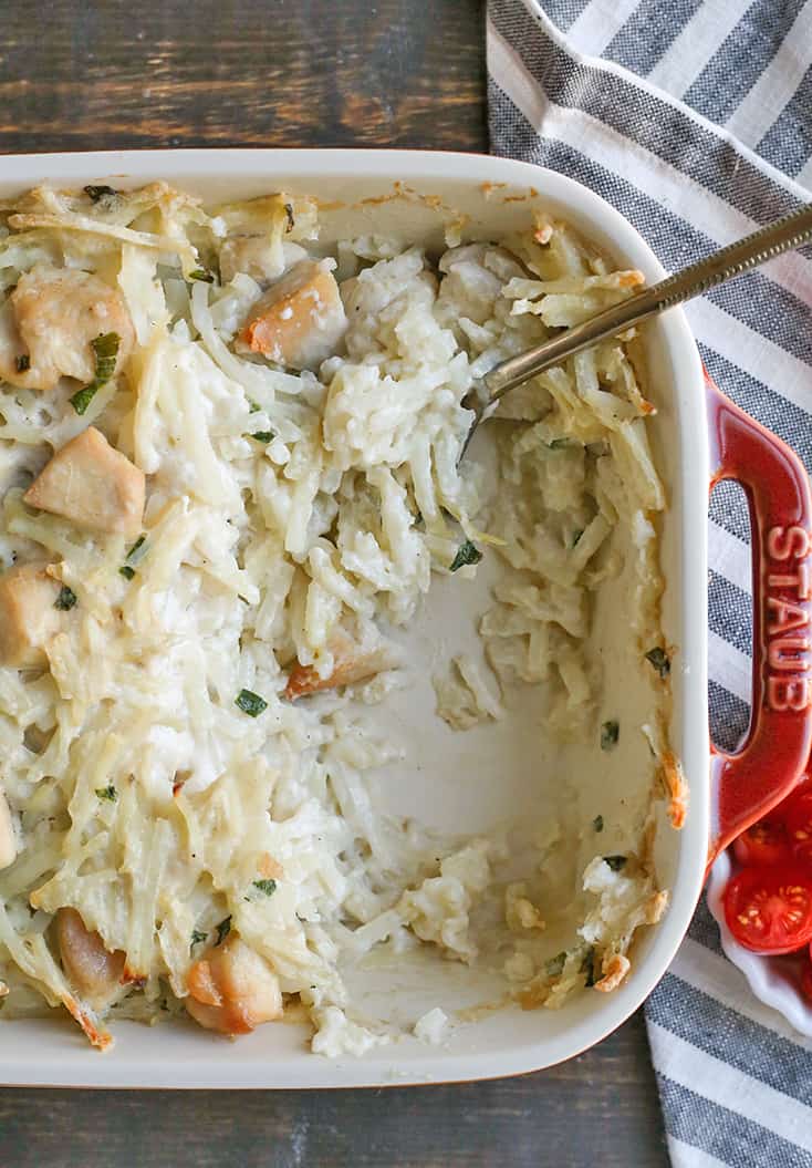 This Paleo Whole30 Chicken Alfredo Casserole is easy to make and pure comfort food. Tender chicken and potatoes covered in a creamy sauce. Gluten free, dairy free, and low FODMAP.