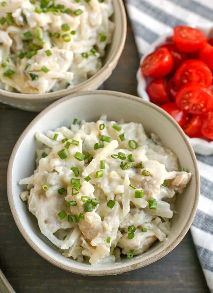 This Paleo Whole30 Chicken Alfredo Casserole is easy to make and pure comfort food. Tender chicken and potatoes covered in a creamy sauce. Gluten free, dairy free, and low FODMAP.