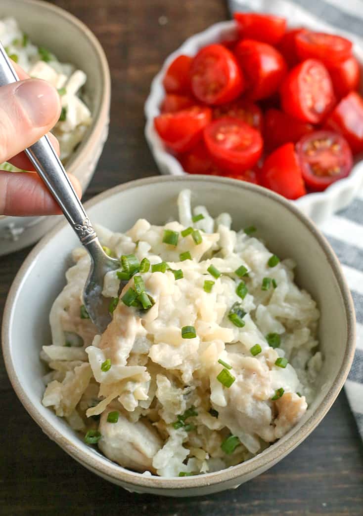 This Paleo Whole30 Chicken Alfredo Casserole is easy to make and pure comfort food. Tender chicken and potatoes covered in a creamy sauce. Gluten free, dairy free, and low FODMAP.