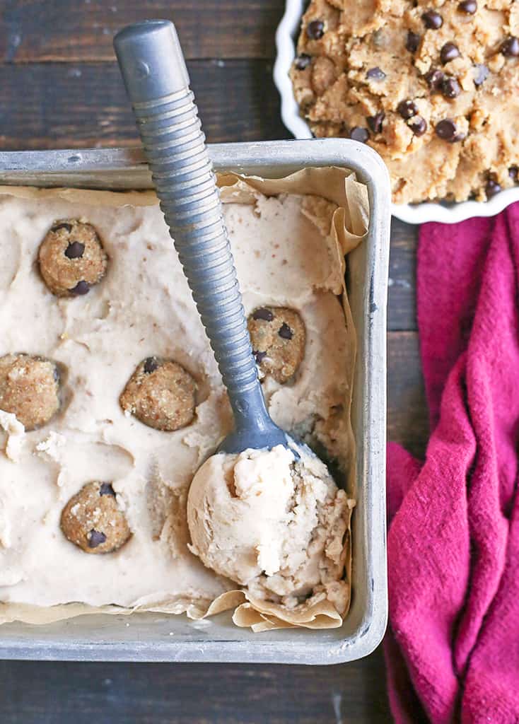 This Paleo Cookie Dough Ice Cream is rich, creamy, and so delicious. Vanilla dairy free ice cream with chunks of edible cookie dough that is vegan, nut free, egg free, gluten free, and naturally sweetened.