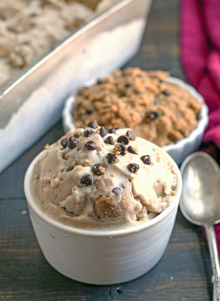 This Paleo Cookie Dough Ice Cream is rich, creamy, and so delicious. Vanilla dairy free ice cream with chunks of edible cookie dough that is vegan, nut free, egg free, gluten free, and naturally sweetened.