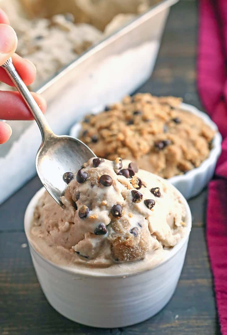 This Paleo Cookie Dough Ice Cream is rich, creamy, and so delicious. Vanilla dairy free ice cream with chunks of edible cookie dough that is vegan, nut free, egg free, gluten free, and naturally sweetened.