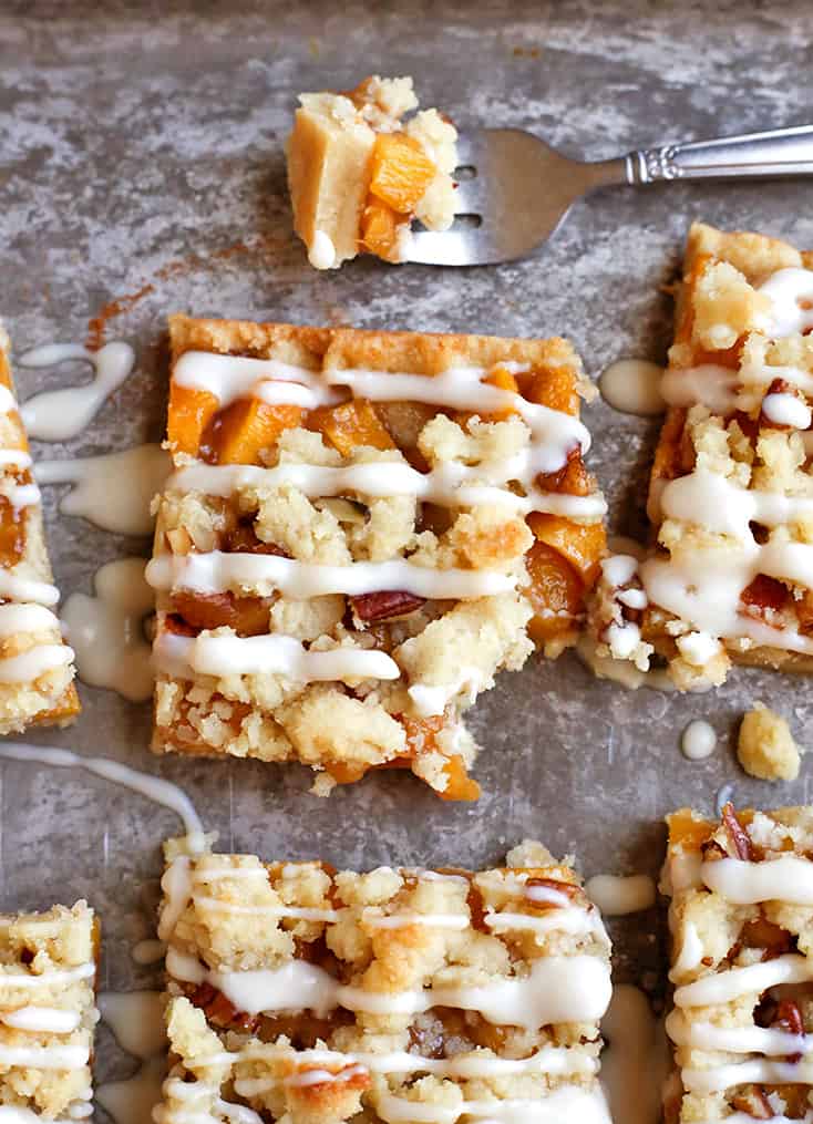 These Paleo Peach Pie Crumb Bars have all the flavor of the classic pie, but made was easier! They are vegan, gluten free, dairy free, egg free, and naturally sweetened.