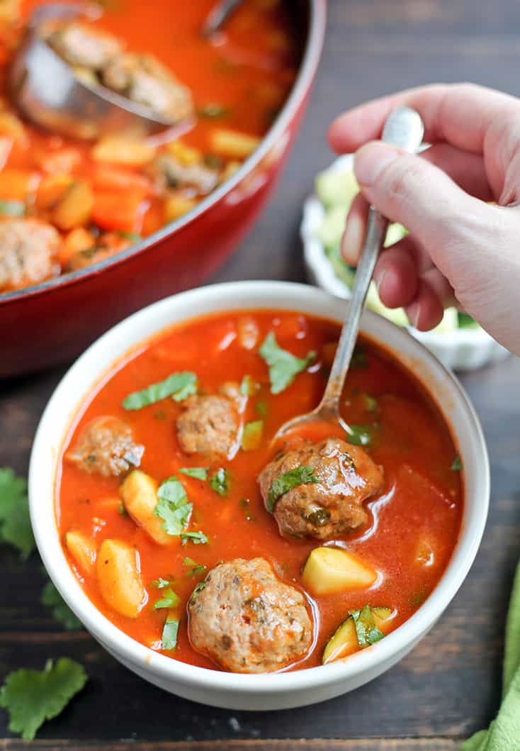 This Paleo Whole30 Mexican Meatball Soup is flavorful, packed with veggies, and so delicious! Gluten free, dairy free, egg free and nut free.