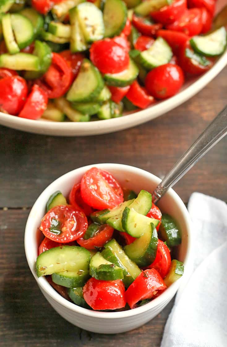 This Paleo Whole30 Tomato Cucumber Salad is quick to make and so delicious! A great, light and refreshing side dish. It's gluten free, dairy free, low carb and low FODMAP.