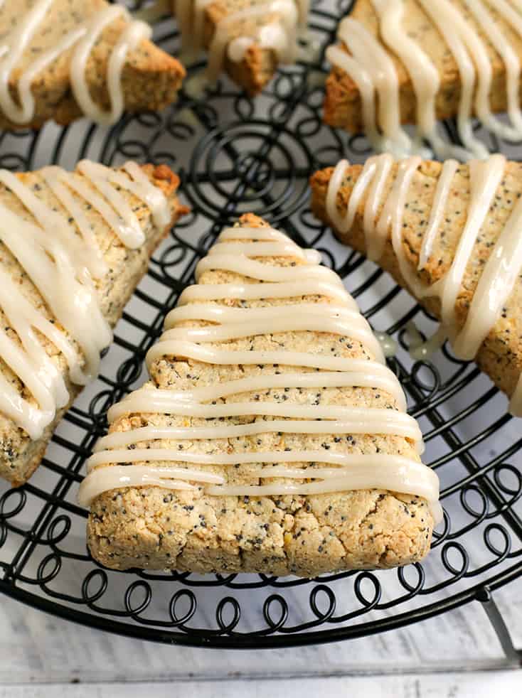 These Paleo Lemon Poppy Seed Scones are light, fresh and so delicious! A great summer dessert that is gluten free, dairy free and naturally sweetened.