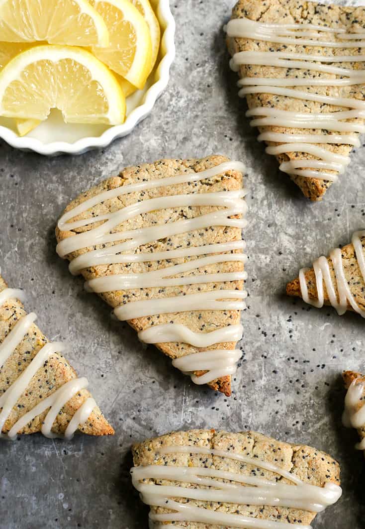 These Paleo Lemon Poppy Seed Scones are light, fresh and so delicious! A great summer dessert that is gluten free, dairy free and naturally sweetened.