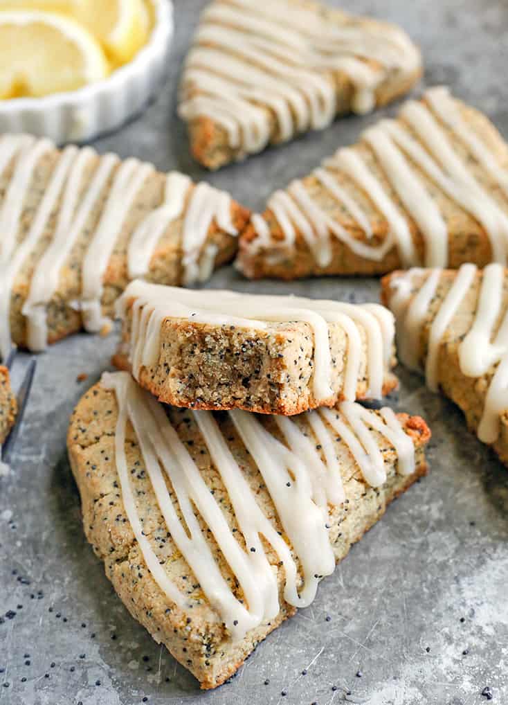 These Paleo Lemon Poppy Seed Scones are light, fresh and so delicious! A great summer dessert that is gluten free, dairy free and naturally sweetened.