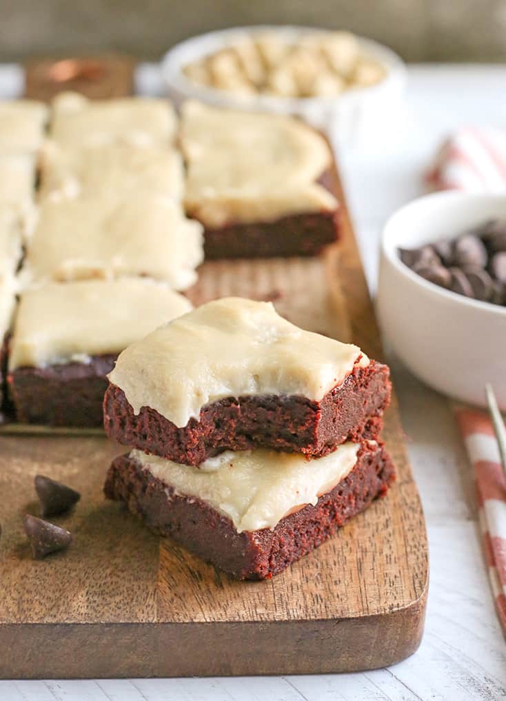 These Paleo Red Velvet Brownies are rich and have a sweet dairy free cheesecake topping. They are so delicious and gluten free, dairy free, naturally sweetened with a nut free option.
