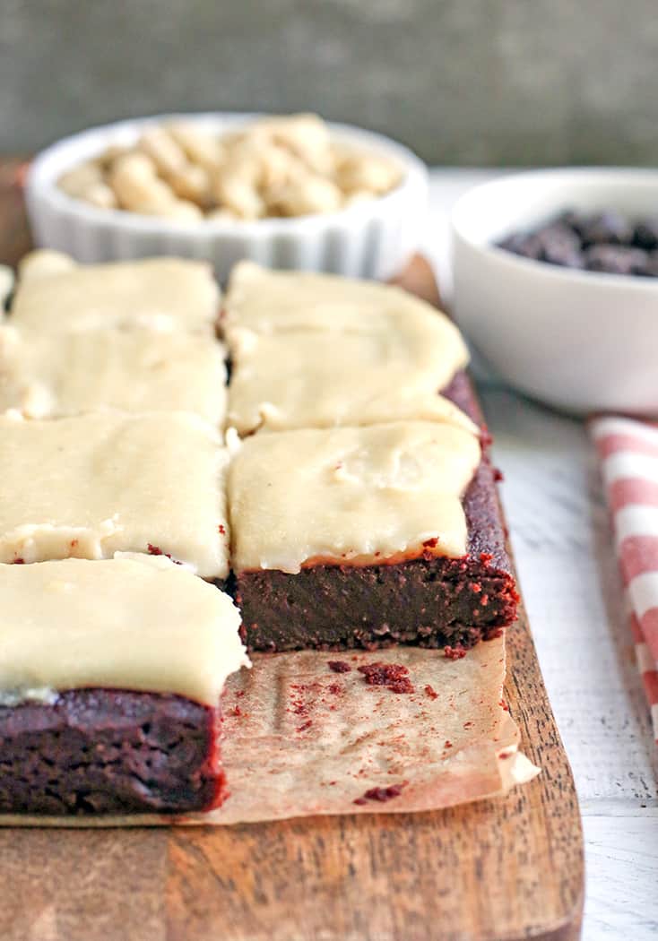 These Paleo Red Velvet Brownies are rich and have a sweet dairy free cheesecake topping. They are so delicious and gluten free, dairy free, naturally sweetened with a nut free option.