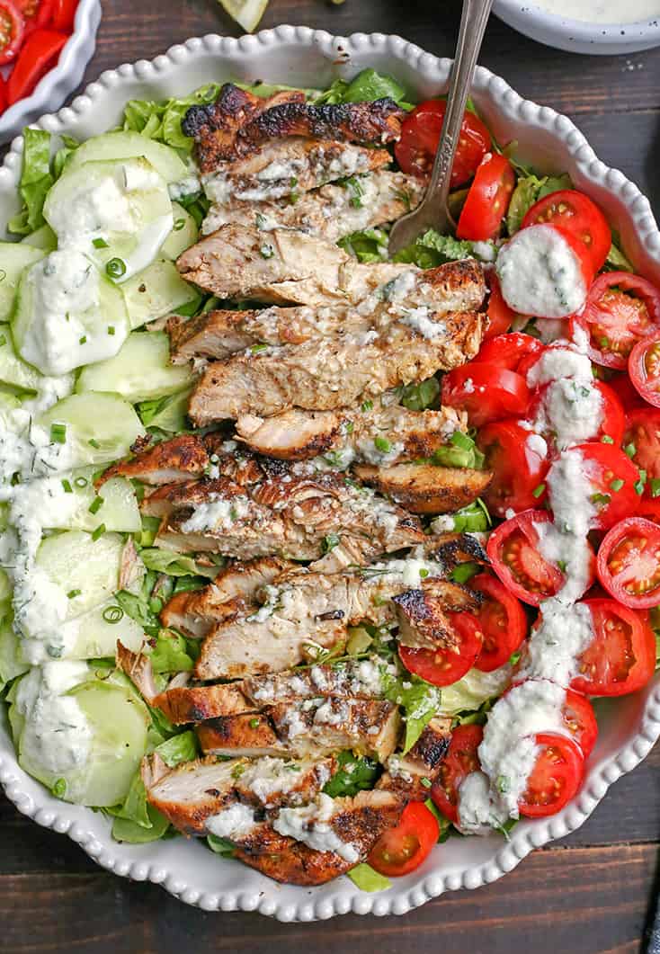 This Paleo Whole30 Chicken Shawarma Salad is healthy and so delicious! A simple marinade infuses the chicken with wonderful flavors and is grilled to perfection. Gluten free, dairy free, low carb, and low FODMAP. 