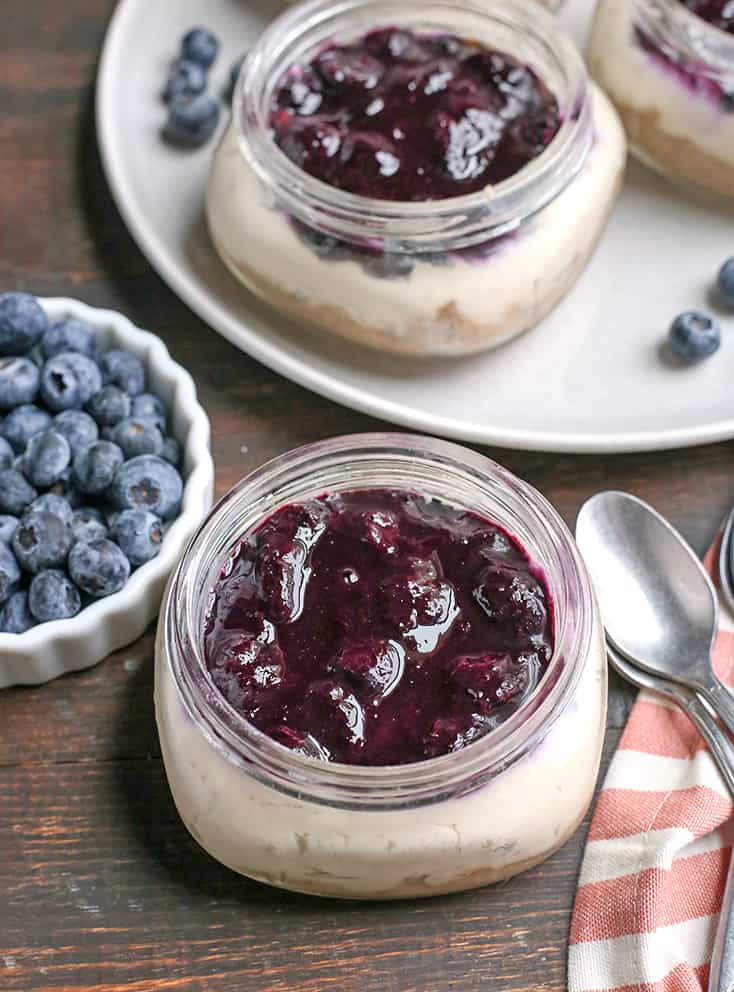 These Paleo Blueberry Cheesecake Jars are the perfect individual dessert. No-bake, easy to make and so delicious. Vegan, dairy free, and naturally sweetened.