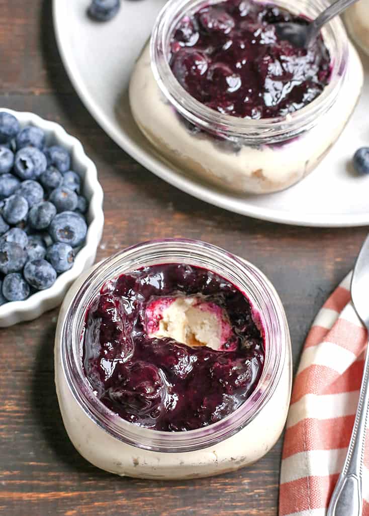 These Paleo Blueberry Cheesecake Jars are the perfect individual dessert. No-bake, easy to make and so delicious. Vegan, dairy free, and naturally sweetened.