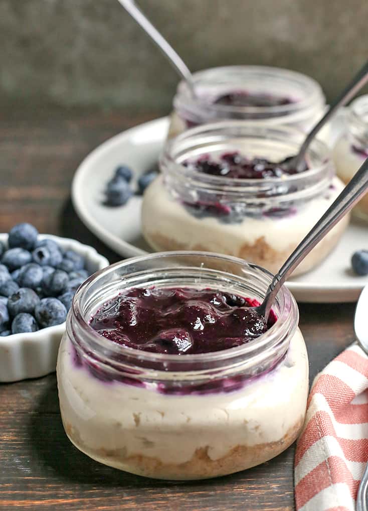 These Paleo Blueberry Cheesecake Jars are the perfect individual dessert. No-bake, easy to make and so delicious. Vegan, dairy free, and naturally sweetened.