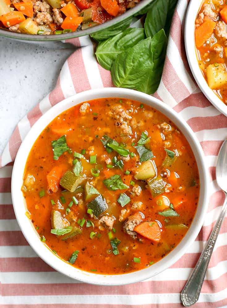This Paleo Whole30 Sausage Summer Vegetable Soup is easy to make and great for using all the summer veggies. Hearty, tasty, and healthy. Gluten free, dairy free, and low FODMAP.