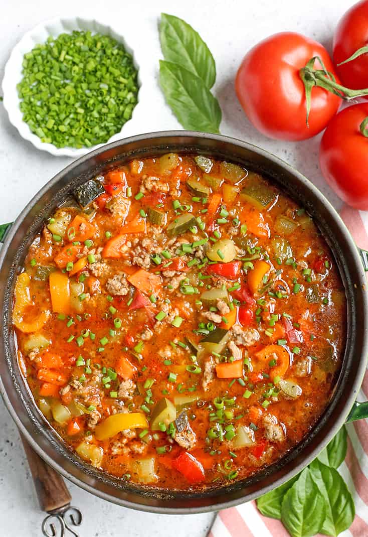 This Paleo Whole30 Sausage Summer Vegetable Soup is easy to make and great for using all the summer veggies. Hearty, tasty, and healthy. Gluten free, dairy free, and low FODMAP.