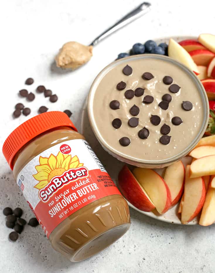 This Paleo SunButter Yogurt Fruit Dip is simple to make and so delicious. SunButter and dairy free yogurt combine to make a creamy dip that is perfect for pairing with fruit. It's vegan, naturally sweetened, and low FODMAP. 