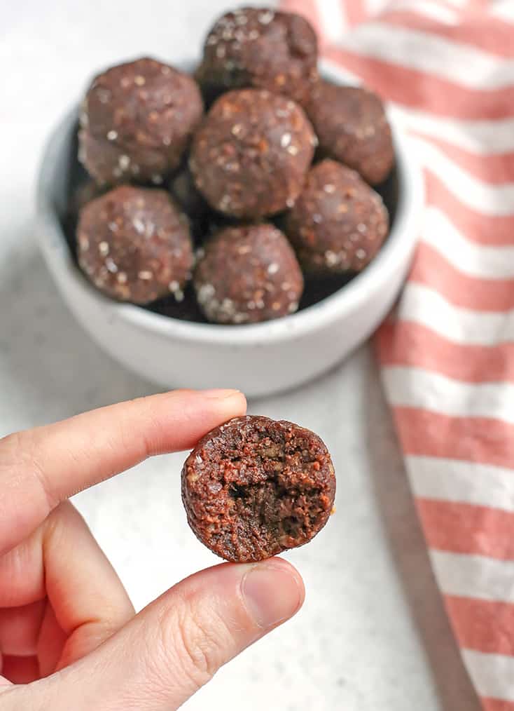 These Paleo German Chocolate Bites are easy to make and so delicious! Toasted coconut, pecans, chocolate and dates combine to make a simple treat. They are vegan, gluten free, dairy free and Whole30.